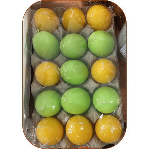 Świeca jajko żólte lub zielone 6x4,5cm 1szt.