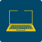 Żółty laptop na granatowym tle